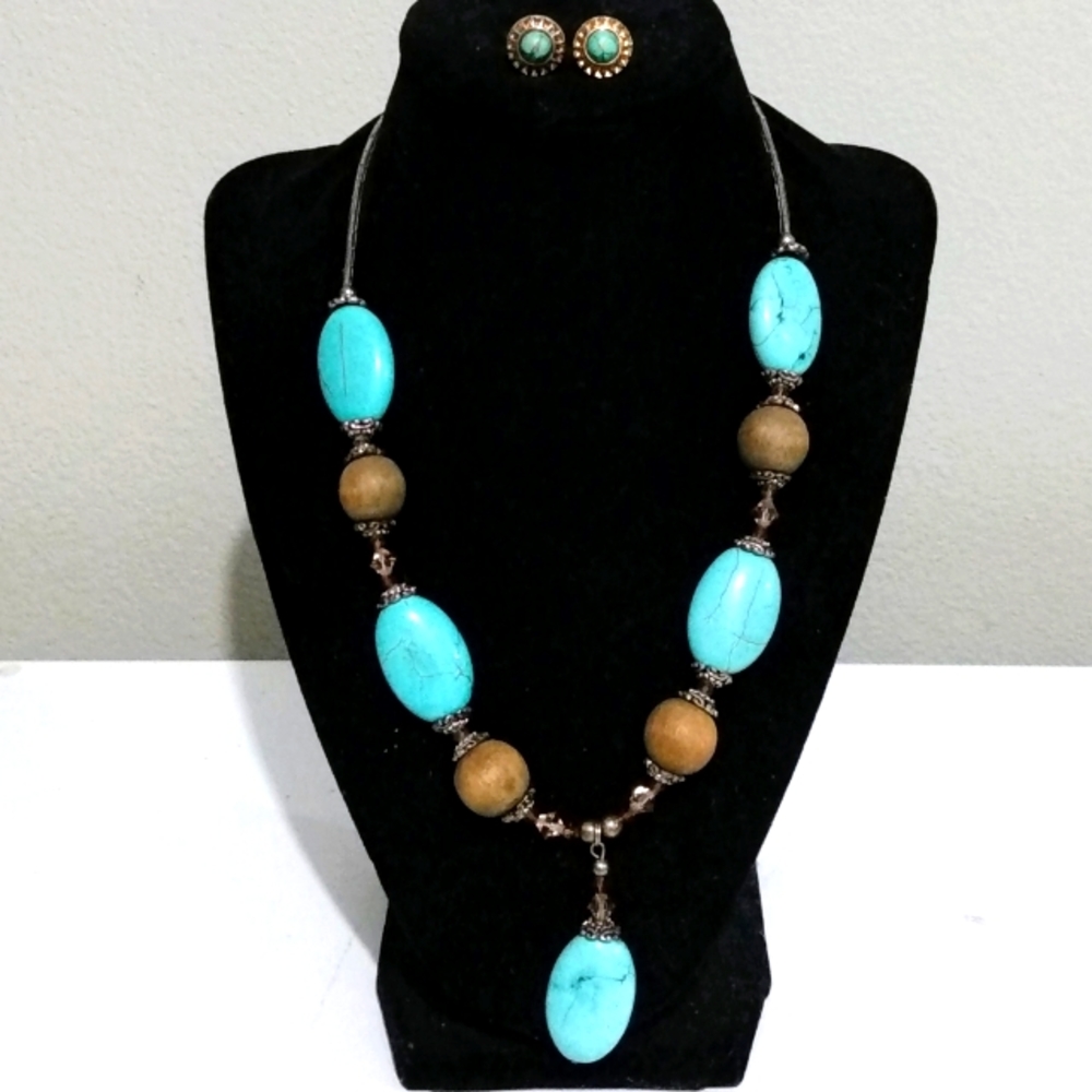 Handmade necklace and a pair of vintage earrings.